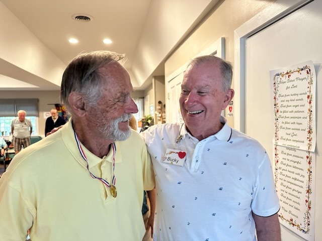 Friends sharing a laugh at Hope Arbor